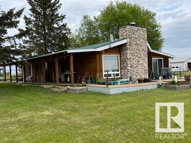 Looking for a new start to farming or adding to your existing operation, give this a good look!! 320 acres of the most amazing property and view overlooking the Athabasca river valley that anyone could ever find along with a gorgeous 1792 sq ft 3 bedroom log home with a 16 by 24 ft log cabin guest house with power, water and sewer, a private RV site with power, water and sewer and a 32 by 40 heated shop with 12 ft ceiling and power and water along with well house/tack room, wood storage and lots more!! Also the Quarter section east of these 2 quarters is for sale and both owners have agreed to sell all 3 quarters together if possible because the east one has access through the west 2 quarters. There is approximately 190 acres of open cultivated land and another 40-50 acres that the seller believes could be cleared yet.